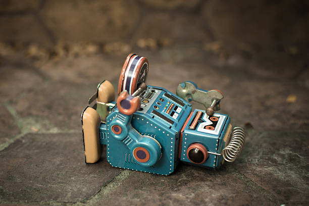 istock Old robot toy lost energy. 635992250