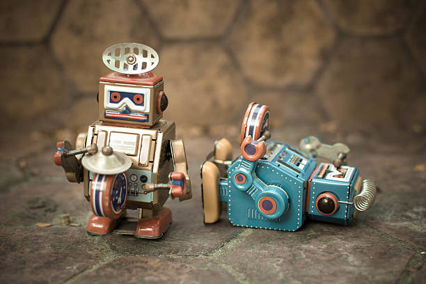 istock Old robot toy lost energy. 635992374