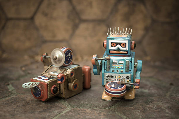 istock Old robot toy lost energy. 635992390