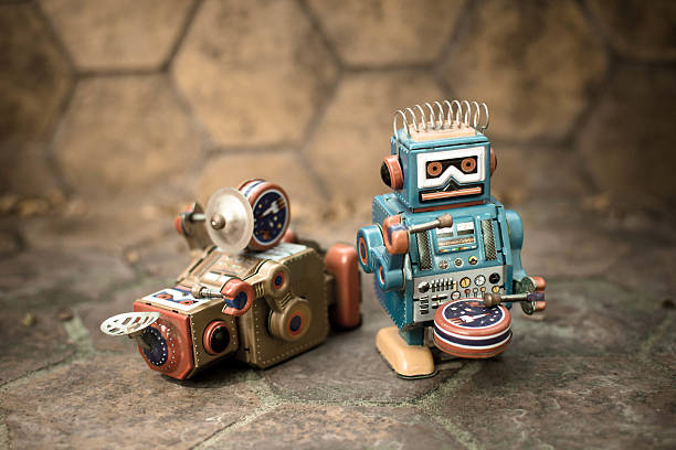 istock Old robot toy lost energy. 635992426