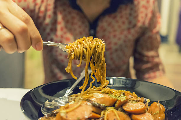 istock yakisoba in the black disk on vintage filter 635997728