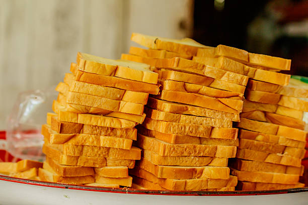 istock slice of bread on zinc tray 635998220