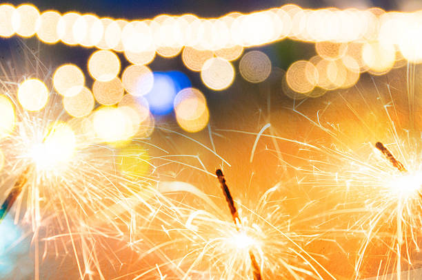 istock sparkler with bokeh de focused blurred background 635998458