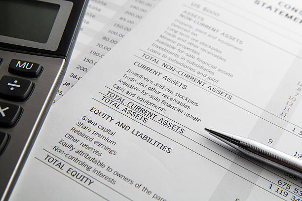 istock Pen, calculator On the financial account documents. Financial co 635999830