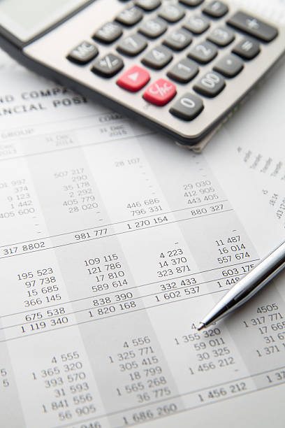 istock Pen, calculator On the financial account documents. Financial co 635999926