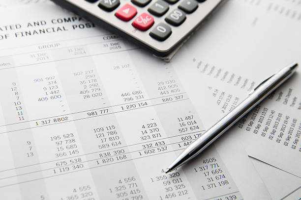 istock Pen, calculator On the financial account documents. Financial co 635999962