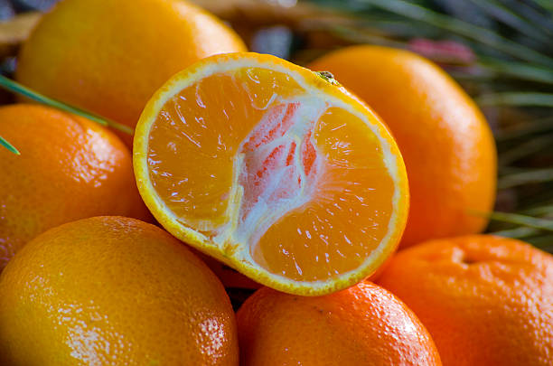 istock Fresh tangerines in a basket 636002220