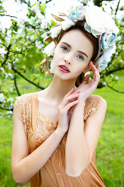 istock Sensual woman in floral wreath 636006420