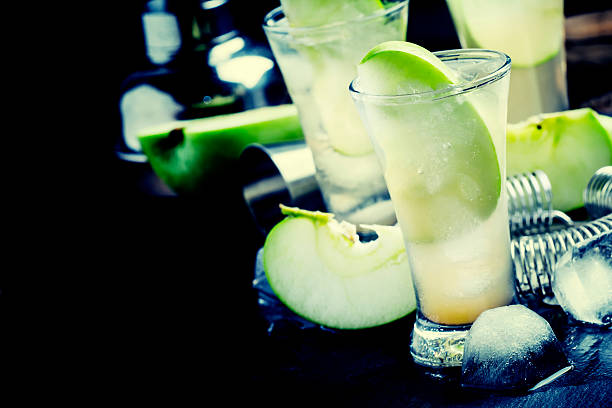 istock Alcoholic cocktail with green apple 636014260