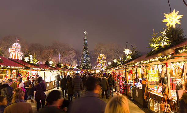 Christmas markt of the Hyde Park's winter WonderLand park, London London, England - December 18, 2016: People walking in the Christmas markt of the Hyde Park's winter WonderLand park. hyde park london photos stock pictures, royalty-free photos & images