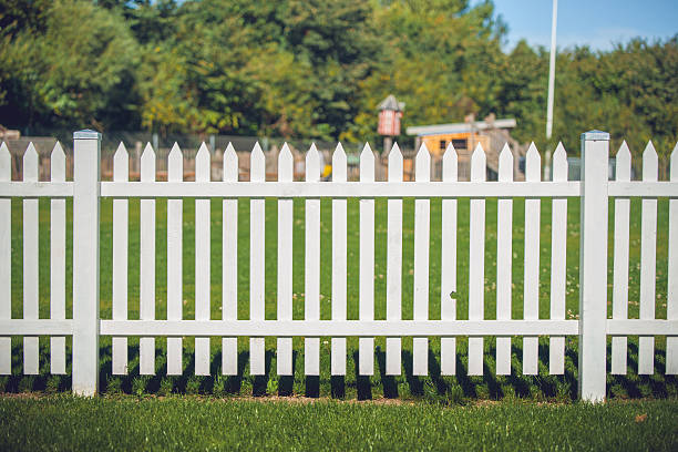 istock Wooden fence in white color 636015876