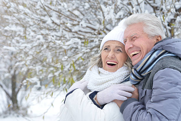 istock Senior couple in winter park 636016170