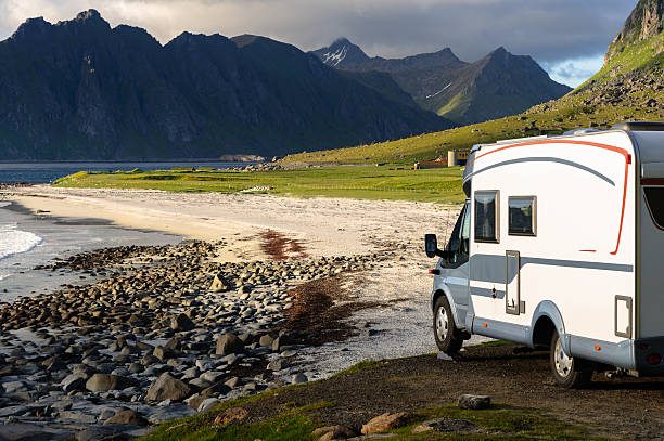 istock Caravan car on Norway beach, Lofoten 636016332