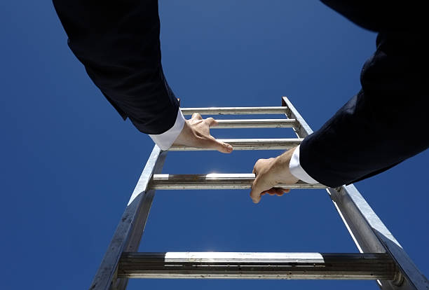 istock Climbing the corporate ladder 636022766