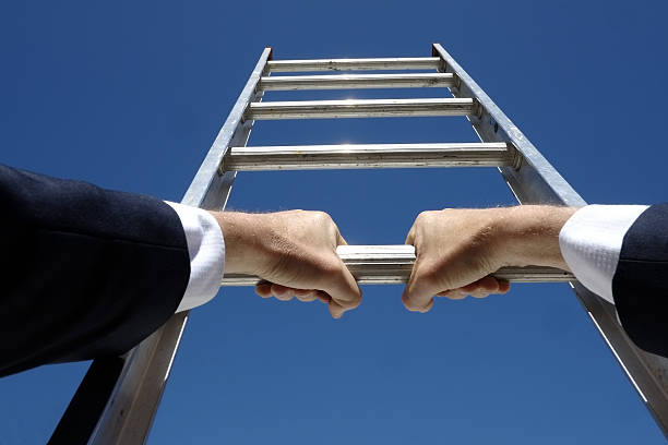 istock Climbing the corporate ladder 636025760