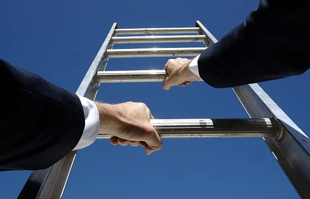 istock Climbing the corporate ladder 636025856
