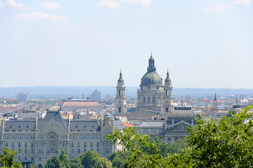 The view of the central part of Budapest and st. Istvan basilica at sunny summer day