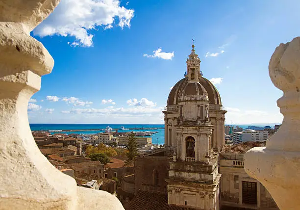 Photo of Catania, Sicily: Old Town Panorama with Cathedral Cupola and Sea