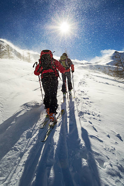 istock ski mountaineering in snowstorm 636029502