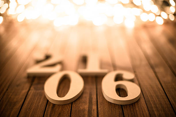 istock text of 2016 on a plank wood 636032562