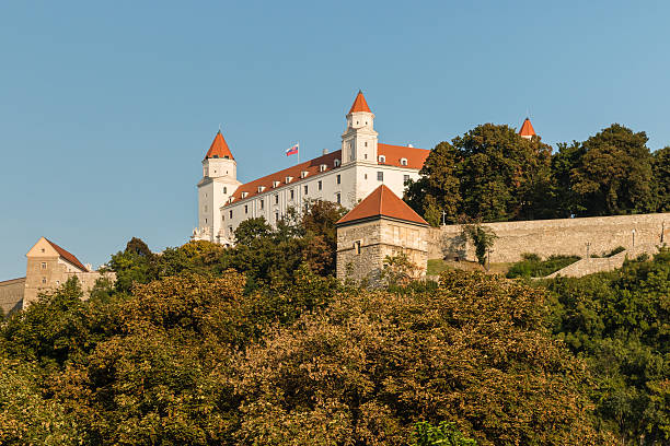 Bratislava Castle in Slovak Republic Bratislava, Slovakia - September 11, 2016: Bratislava castle with park in autumn bratislava castle bratislava castle fort stock pictures, royalty-free photos & images