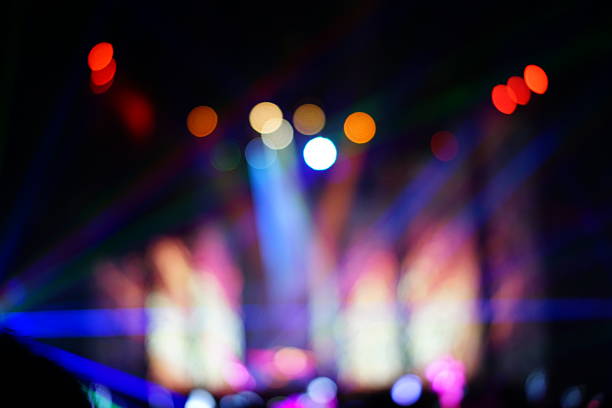 istock Defocused entertainment concert lighting on stage 636042216