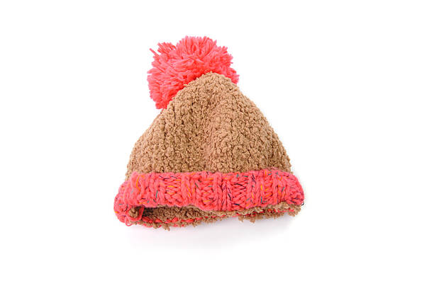 istock knitted hat with pompom isolated on white background 636048312