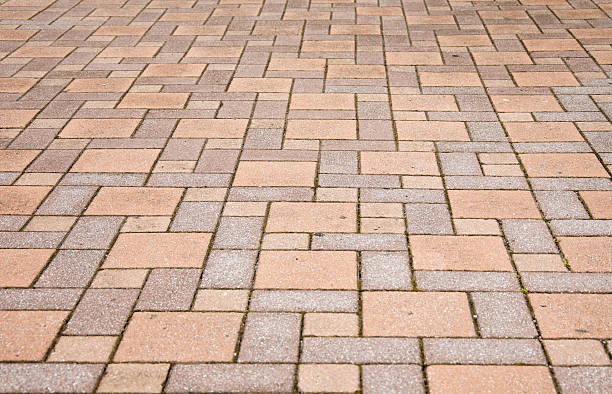 istock paving slabs,patterned paving tiles, cement brick floor backgrou 636048902