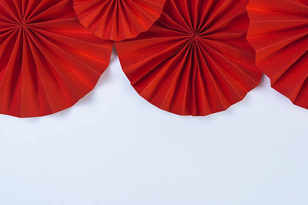 Top View Red Origami Paper Arranged In Circle Fan Shape Stock
