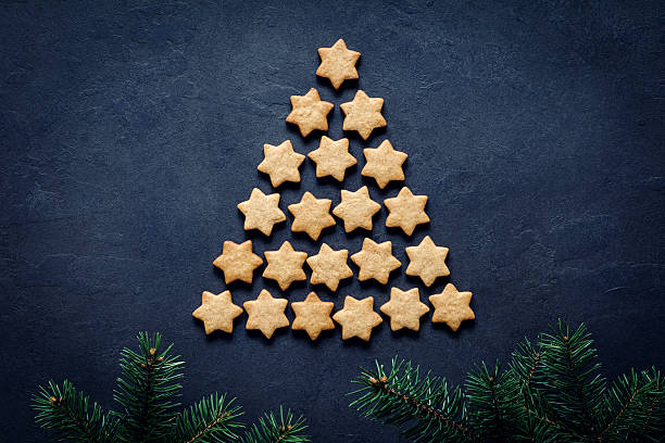 istock Christmas tree made of gingerbread stars cookies 636050530