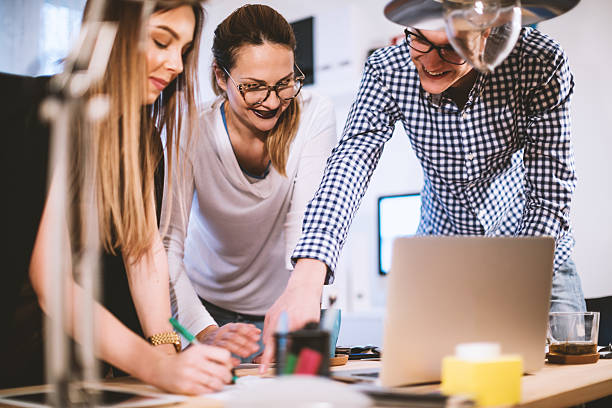 istock Group of young people working together 636052934