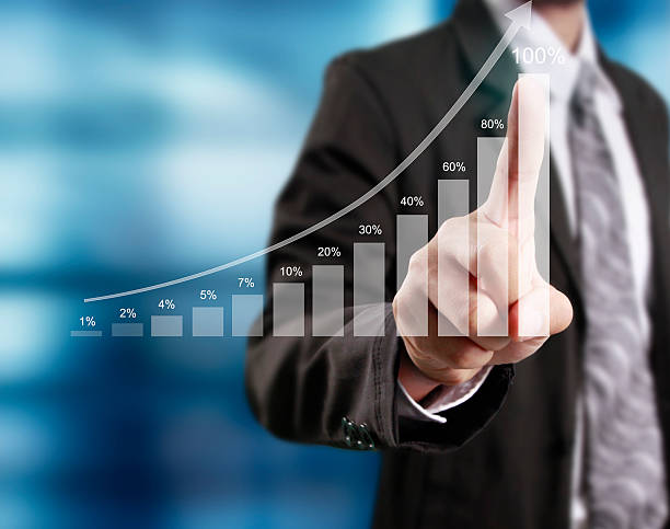 istock financial symbols coming from hand 636055158