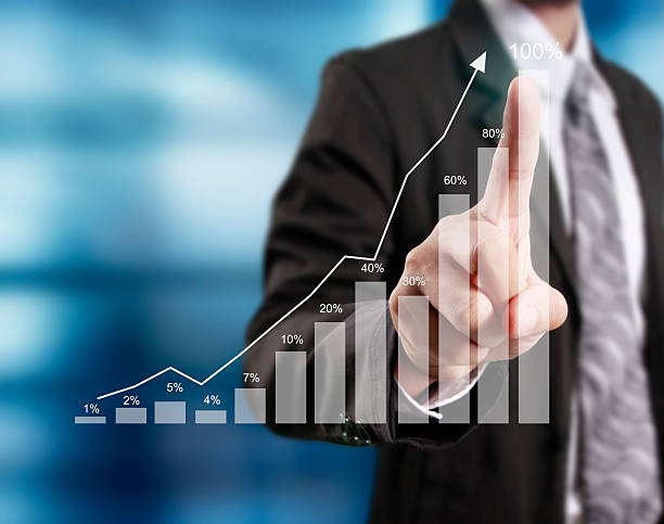 istock financial symbols coming from hand 636055174
