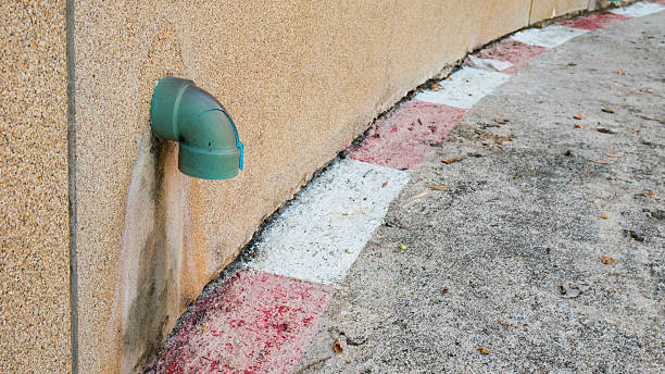 istock pipe or Drain tube in the wall 636055352
