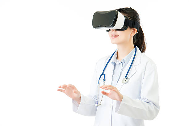 istock asian female doctor check patient condition by VR headset 636056156
