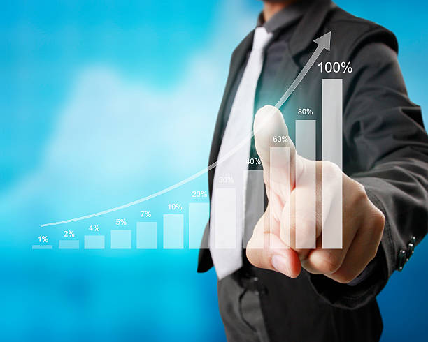 istock financial symbols coming from hand 636056350