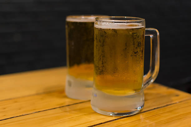 istock Beer with ice in mug glass 636057180