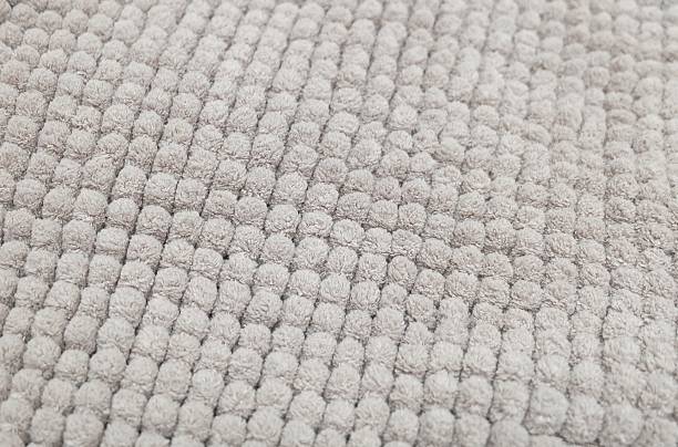 istock Detail of Gray Fluffy Fabric Texture Background 636057498
