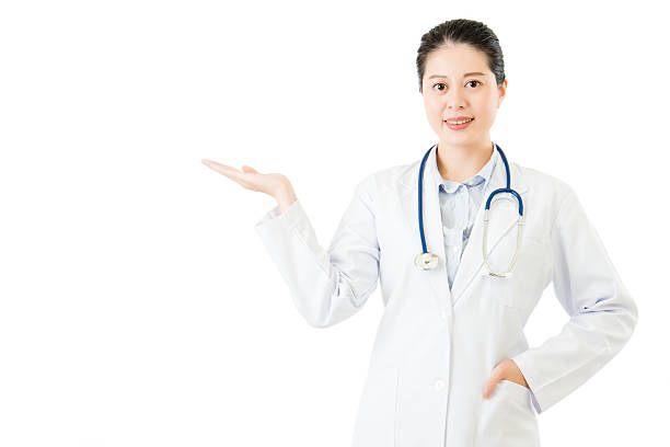 istock asian woman doctor with stethoscope hand display something 636057942