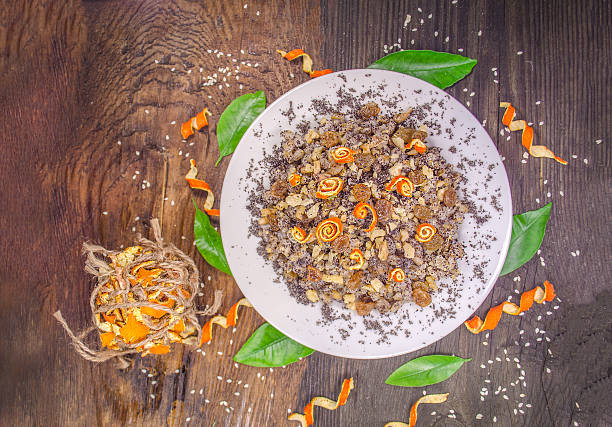 Sweet wheat kutia with nuts, poppy seeds, dried fruits. Bowl with kutia.  Traditional Christmas kutia