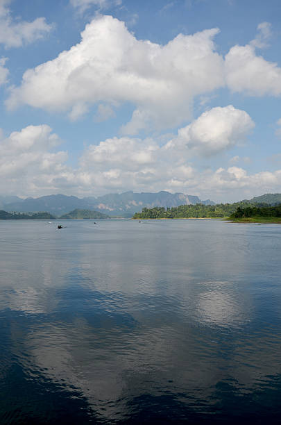 istock Thai people sail long tail boat in Cheow Lan Lake 636060756