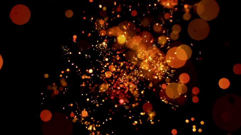 SLO MO Firecracker sparkles on black background