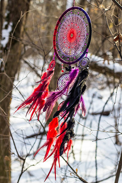 istock Dreamcatcher made of feathers, leather, beads, and ropes 636064774