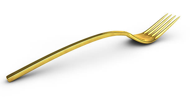 istock render of a golden fork on a white background 636066574
