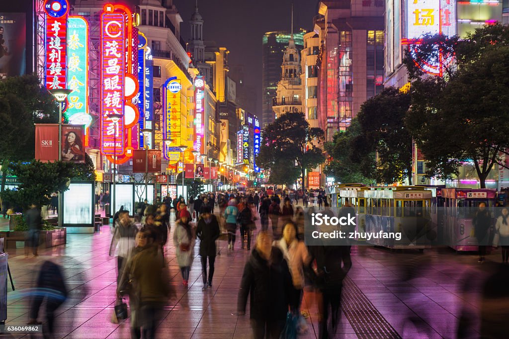 Crowd in Nanjing Road Night view of Nanjing Road in Shanghai. China - East Asia Stock Photo