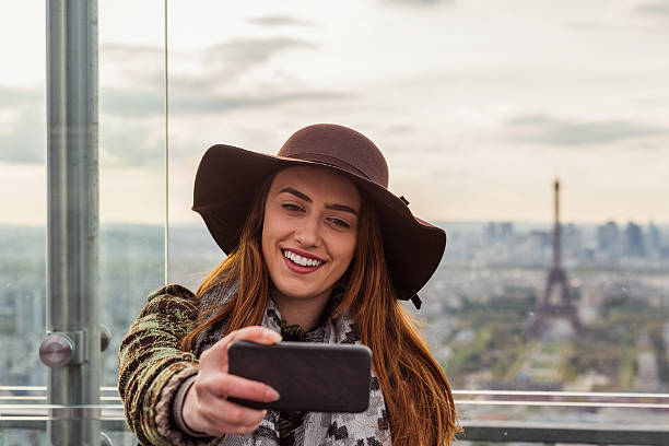 istock Smiling woman on a vacation in Paris 636073226
