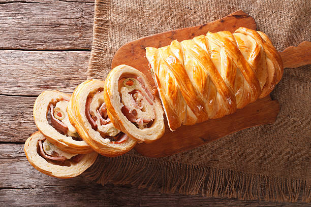 istock Venezuelan Christmas Pan de jamon close-up on the table. horizontal 636073896