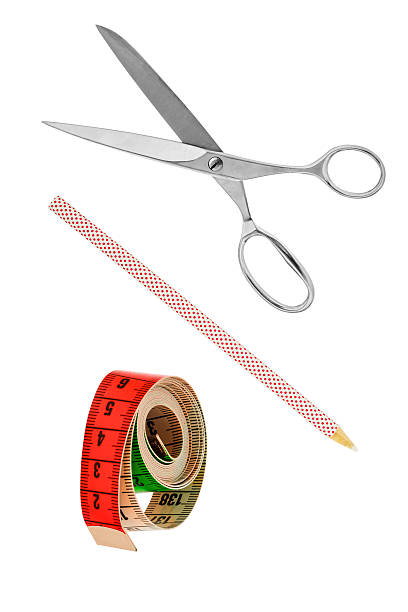 istock Scissors pen and tape measure 636073994