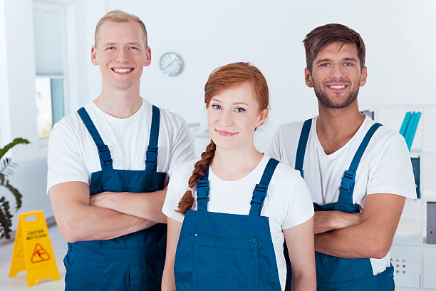 istock Team of cleaners 636074576