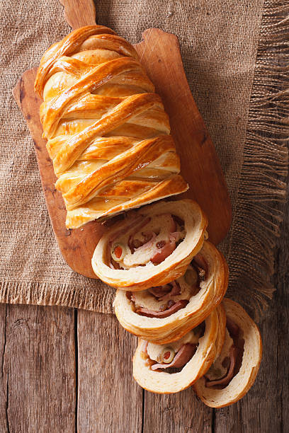 istock Venezuelan Christmas Pan de jamon close-up on the table. Vertical 636074612